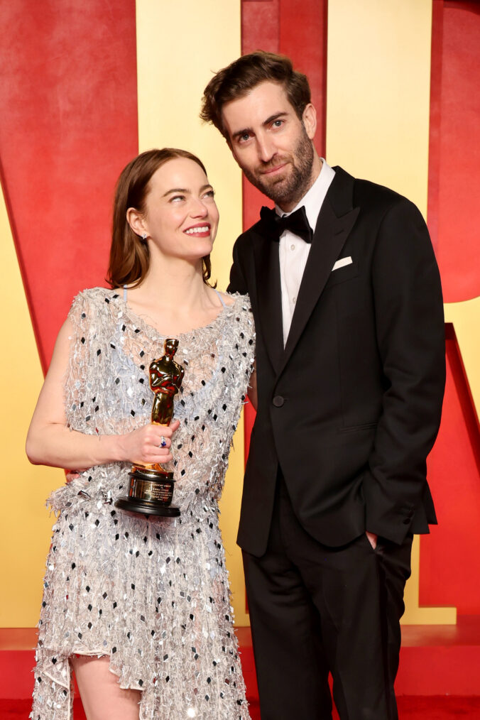 Emma Stone and Dave McCary attend the 2024 Vanity Fair Oscar Party Hosted By Radhika Jones at Wallis Annenberg Center for the Performing Arts on March 10, 2024 in Beverly Hills, California.
