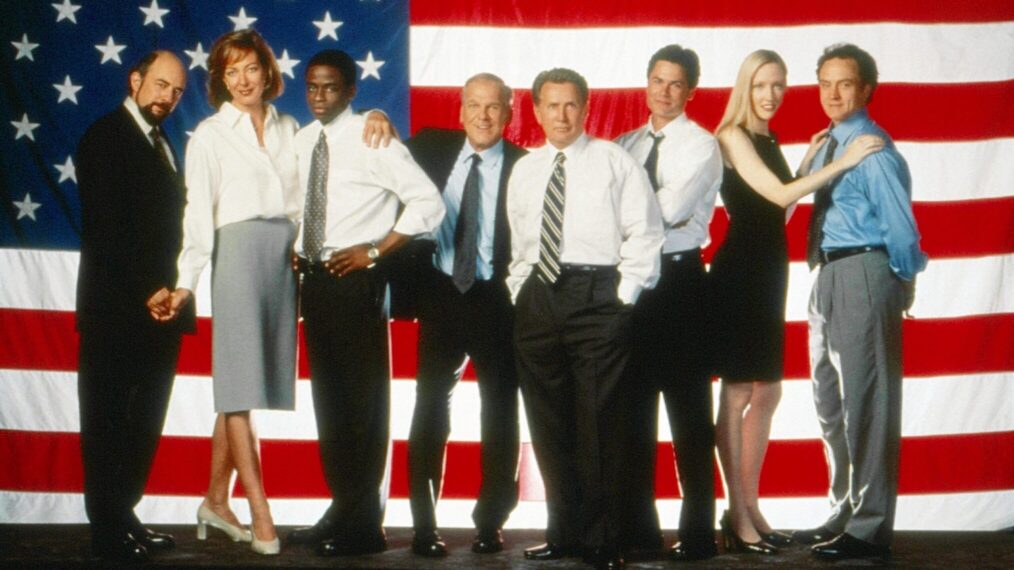 The cast of The West Wing Season 1: Richard Schiff, Allison Janney, Dule Hill, John Spencer, Martin Sheen, Rob Lowe, Janel Moloney, and Bradley Whitford