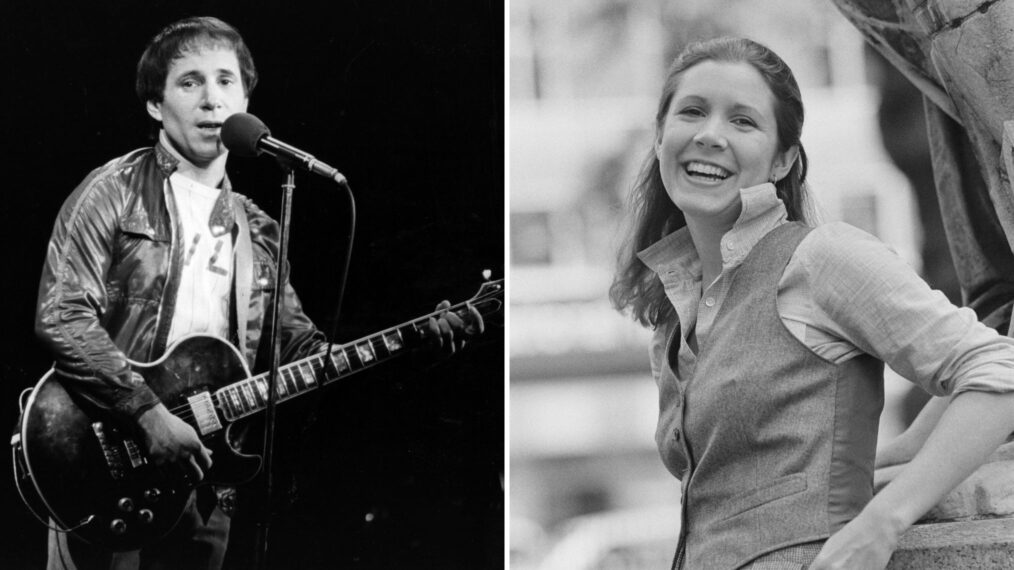 Paul Simon on stage and Carrie Fisher.