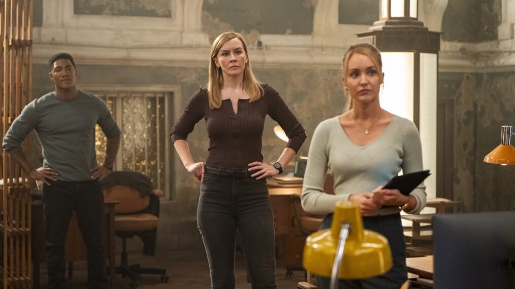Carter Redwood as Special Agent Andre Raines, Eva-Jane Willis as Europol Agent Megan “Smitty” Garretson, and Christina Wolfe as Special Agent Amanda Tate in the 'FBI: International' Season 4 Premiere 