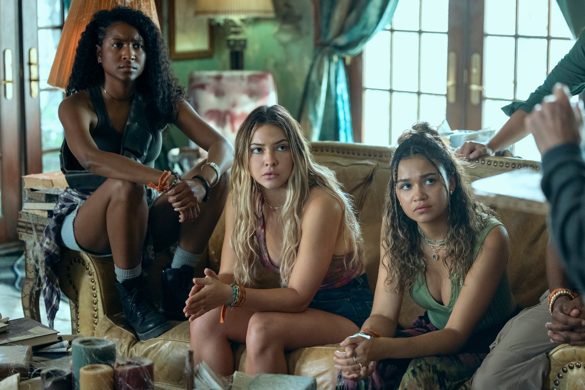 Carlacia Grant as Cleo, Madelyn Cline as Sarah Cameron, Madison Bailey as Kiara in 'Outer Banks' Season 4