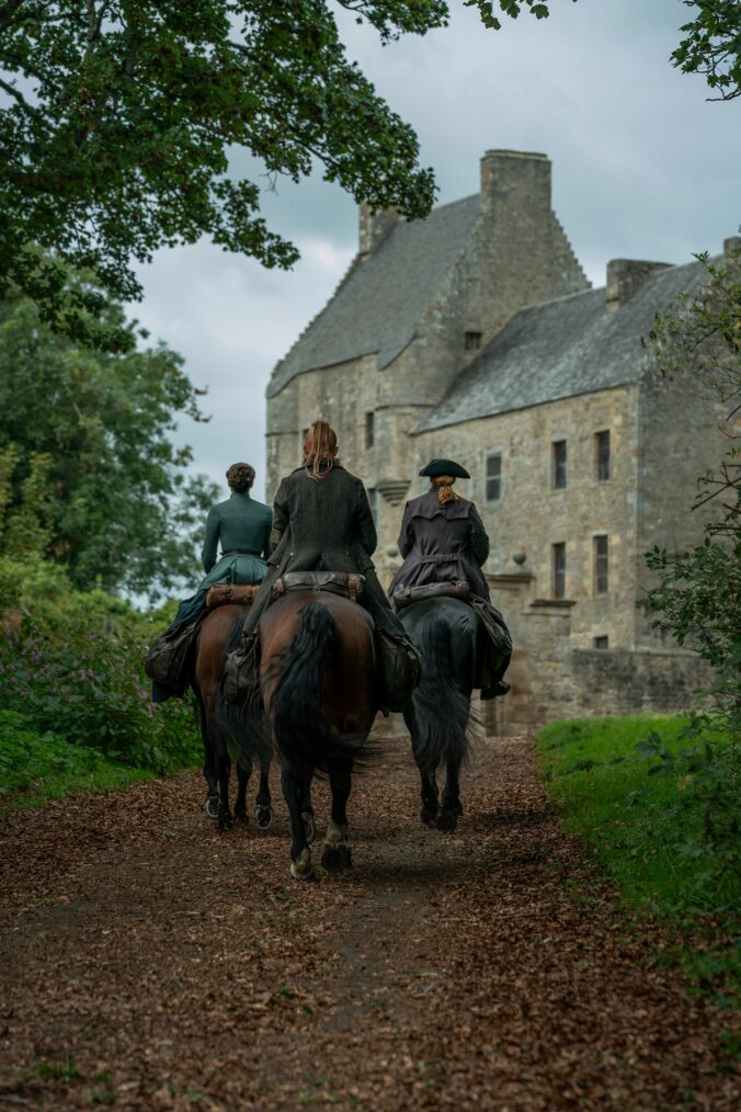 Caitriona Balfe, John Bell, and Sam Heughan in 'Outlander' Season 7B
