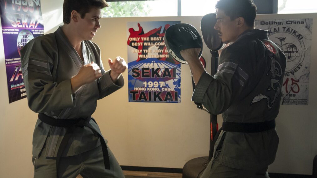 Patrick Luwis as Axel, Lewis Tan as Sensei Wolf in Cobra Kai