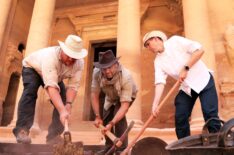 Explorer Josh Gates and Professor Pearce Paul Creasman with archaeologist Matthew Vincent digging in front of the Treasury at Petra in Expedition Unknown