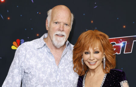 Rex Linn and Reba McEntire attend
