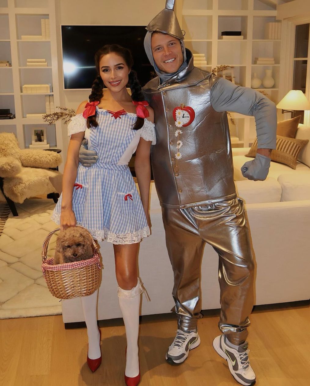 Olivia Culpo and Christian McCaffrey in a Halloween costume.