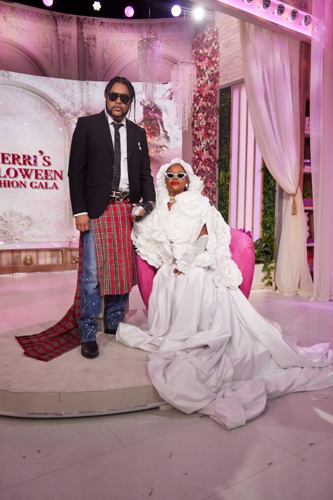 Host Sherri Shepherd and executive producer Jawn Murray in Halloween costume as Rihanna and A$AP Rocky at the 2023 Met Gala
