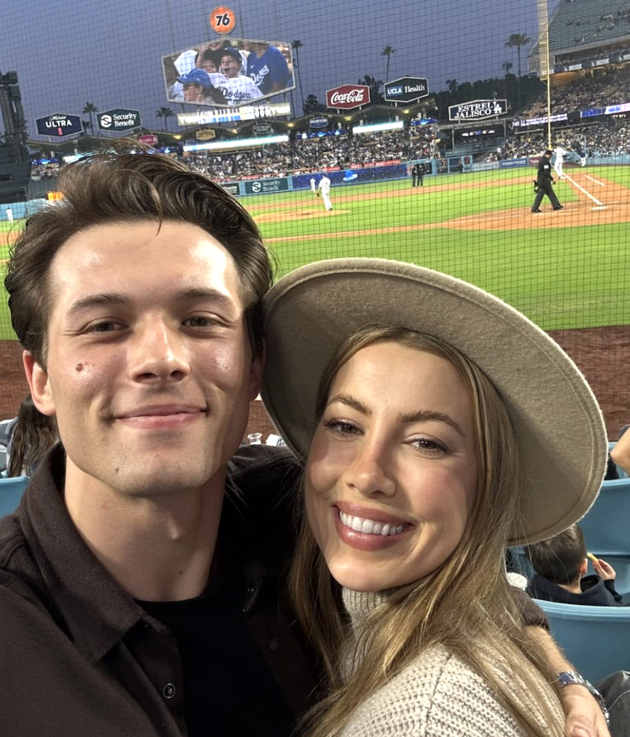 Leo Howard and Natasha Hall at a baseball game