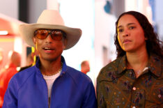 Pharrell Williams and Helen Lasichanh walk in the Paddock prior to the F1 Grand Prix of Saudi Arabia at Jeddah Corniche Circuit on March 09, 2024 in Jeddah, Saudi Arabia.