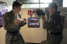 Patrick Luwis as Axel, Lewis Tan as Sensei Wolf in Cobra Kai in Cobra Kai