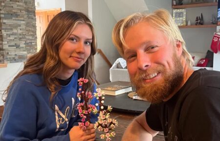 Ethan Plath's new girlfriend and Ethan Plath holding flowers.
