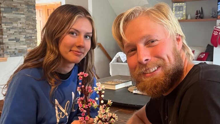 Ethan Plath's new girlfriend and Ethan Plath holding flowers.