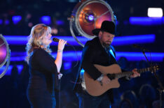 Trisha Yearwood and Garth Brooks perform onstage during MusiCares Person of the Year