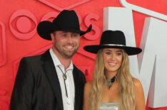 Devlin 'Duck' Hodges and Lainey Wilson (R) attend the 2024 CMT Music Awards
