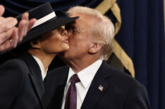 U.S. President-elect Donald Trump greets Melania Trump as he arrives for inauguration ceremonies