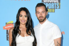 Nikki Bella and Artem Chigvintsev attend Nickelodeon Kids' Choice Sports 2019