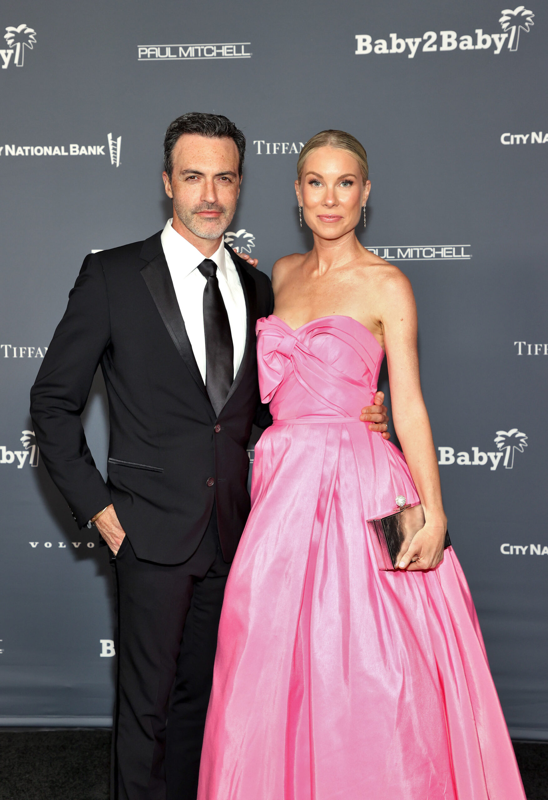 WEST HOLLYWOOD, CALIFORNIA - NOVEMBER 13: (L-R) Reid Scott and Elspeth Keller attend the Baby2Baby 10-Year Gala presented by Paul Mitchell on November 13, 2021 in West Hollywood, California.