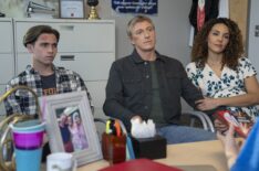 Tanner Buchanan as Robby Keene, William Zabka as Johnny Lawrence, Vanessa Rubio as Carmen in Cobra Kai