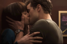 Dakota Johnson and Jamie Dornan kissing in an elevator in Fifty Shades of Grey