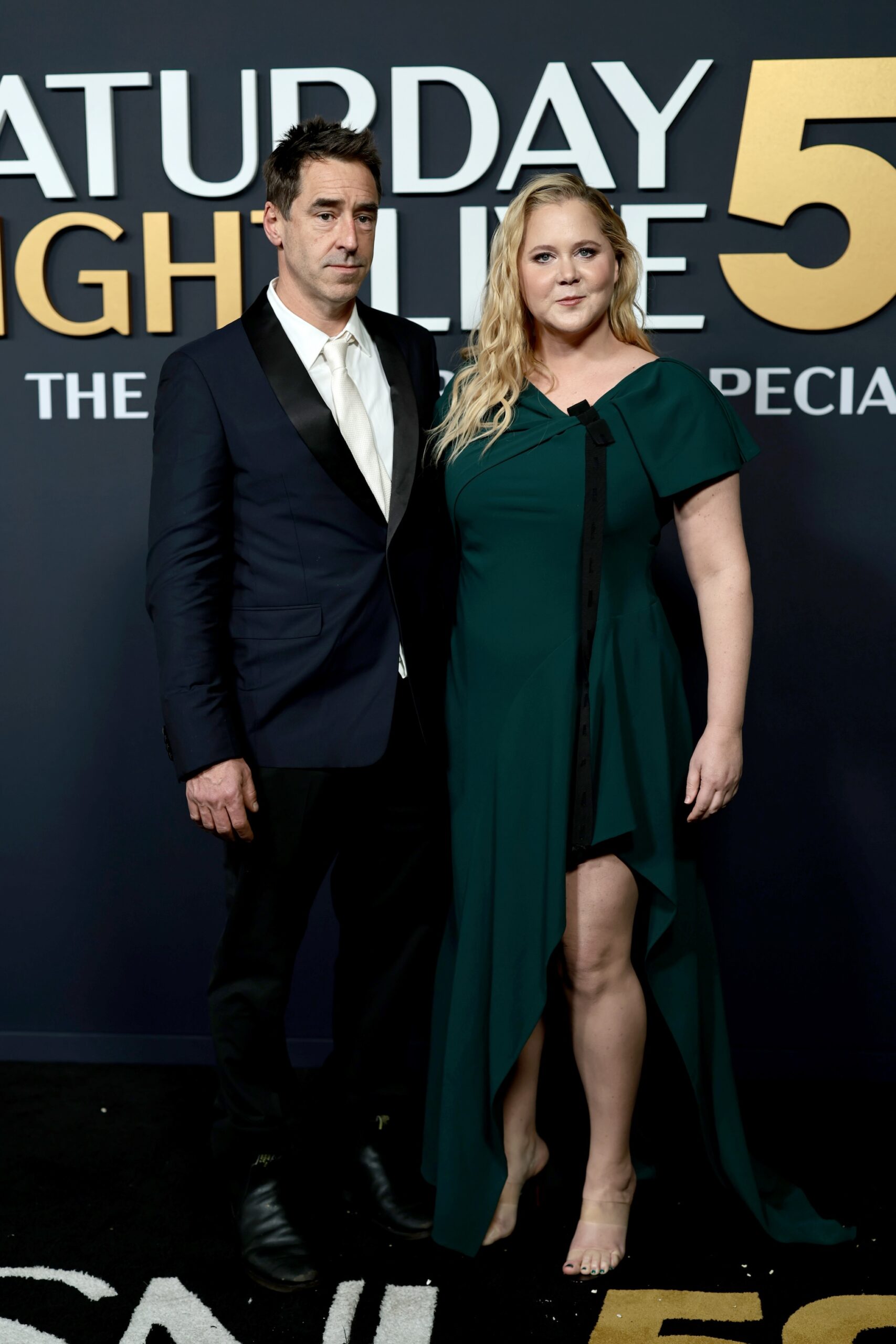 Chris Fischer and Amy Schumer attend SNL50: The Anniversary Special on February 16, 2025 in New York City.