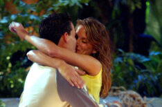 Survivor All-star cast members 'Boston Rob' Mariano and Amber Brkich kiss after Rob proposed marriage and Amber accepted on the set of the Survivor All-stars Finale