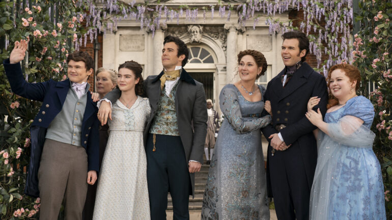 Will Tilston as Gregory Bridgerton, Florence Hunt as Hyacinth Bridgerton, Luke Thompson as Benedict Bridgerton, Ruth Gemmell as Lady Violet Bridgerton, Luke Newton as Colin Bridgerton, Nicola Coughlan as Penelope Featherington in 'Bridgerton' Season 3