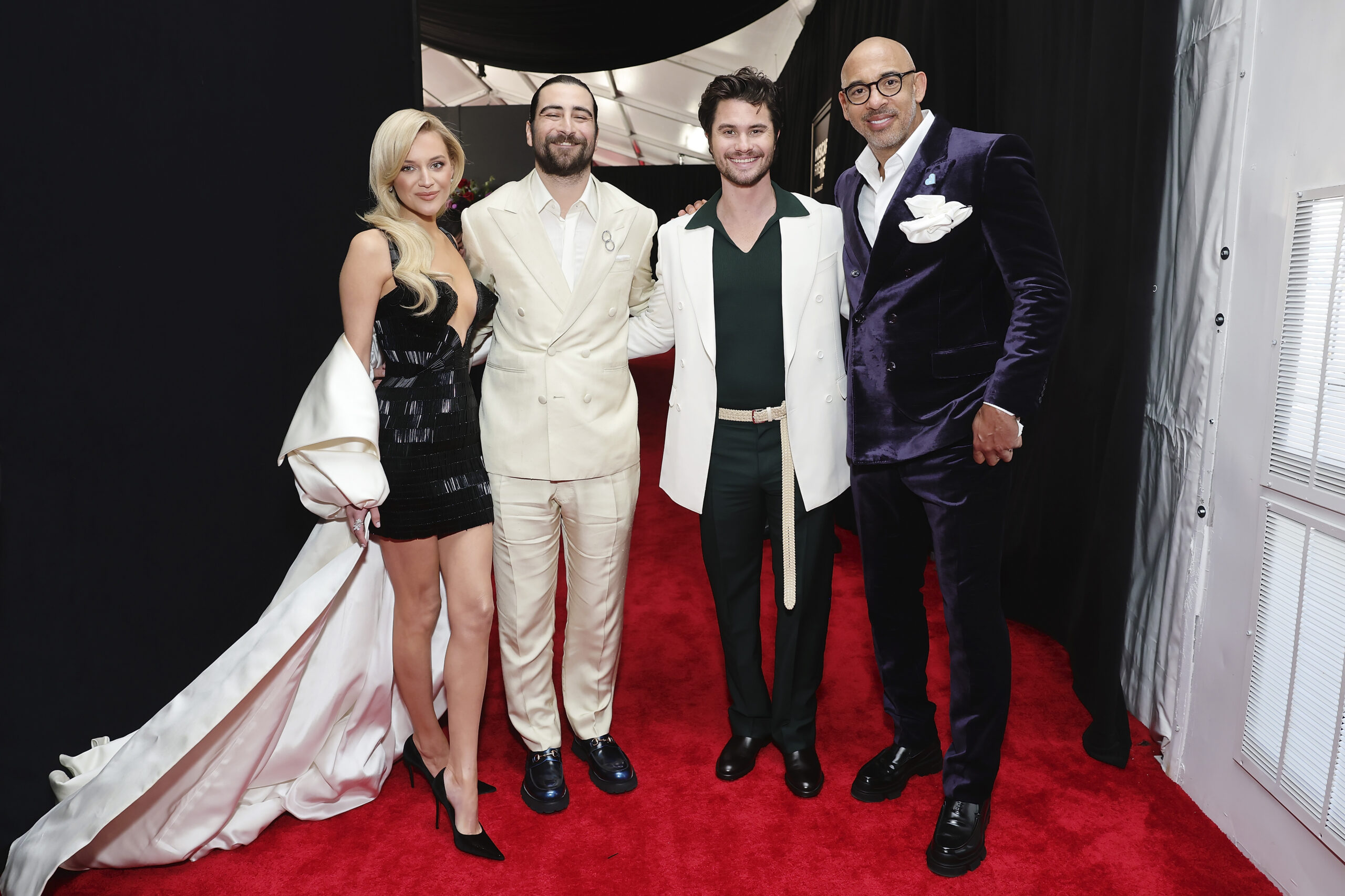 Kelsea Ballerini, Noah Kahan, Chase Stokes and Harvey Mason jr., CEO, MusicCares & Recording Academy attend the 67th Annual GRAMMY Awards