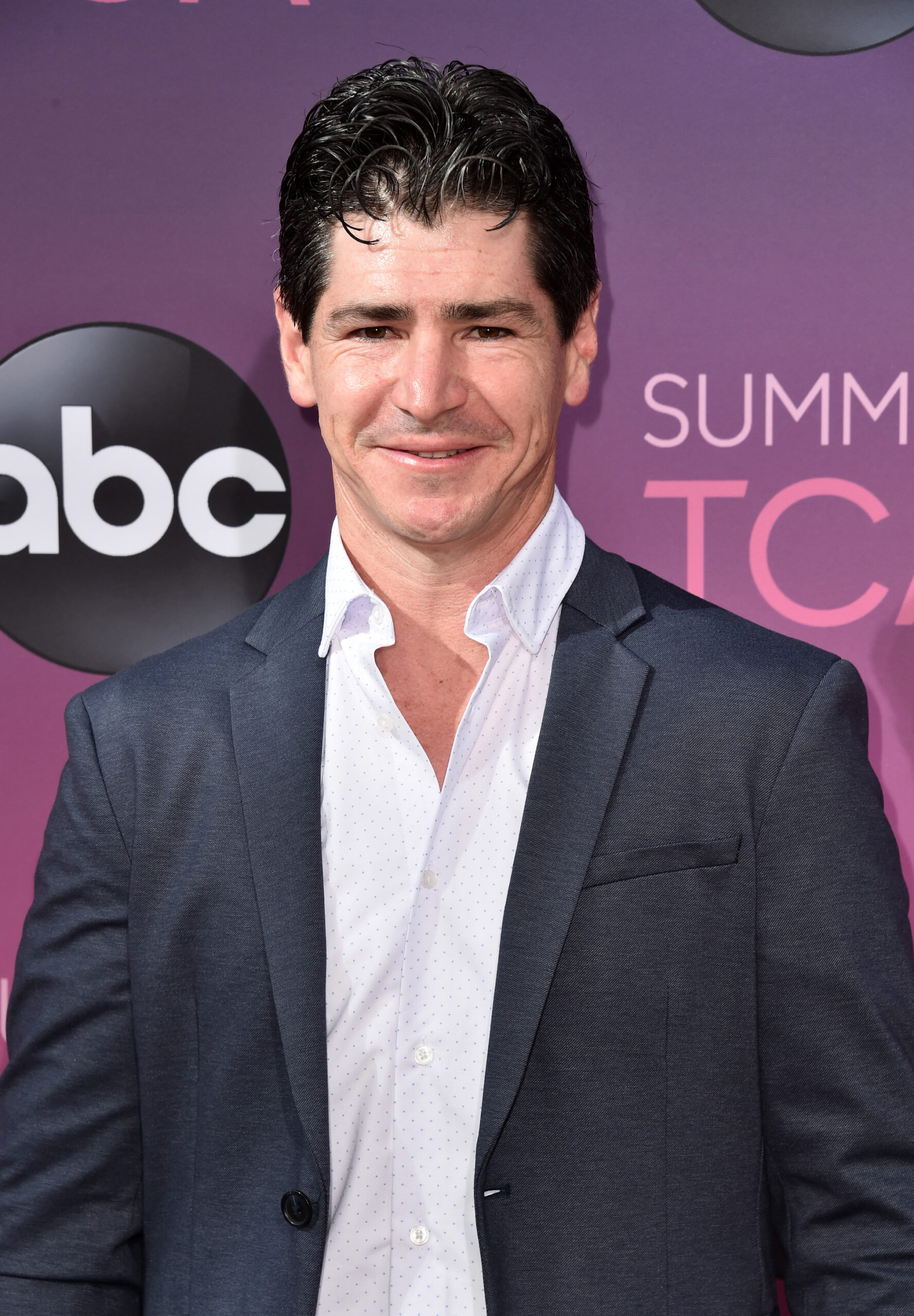 Michael Fishman attends ABC's TCA Summer Press Tour Carpet Event on August 05, 2019 in West Hollywood, California.