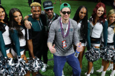 Actor Pete Davidson poses for photos with members of the Philadelphia Eagles cheerleading squad before Super Bowl LIX