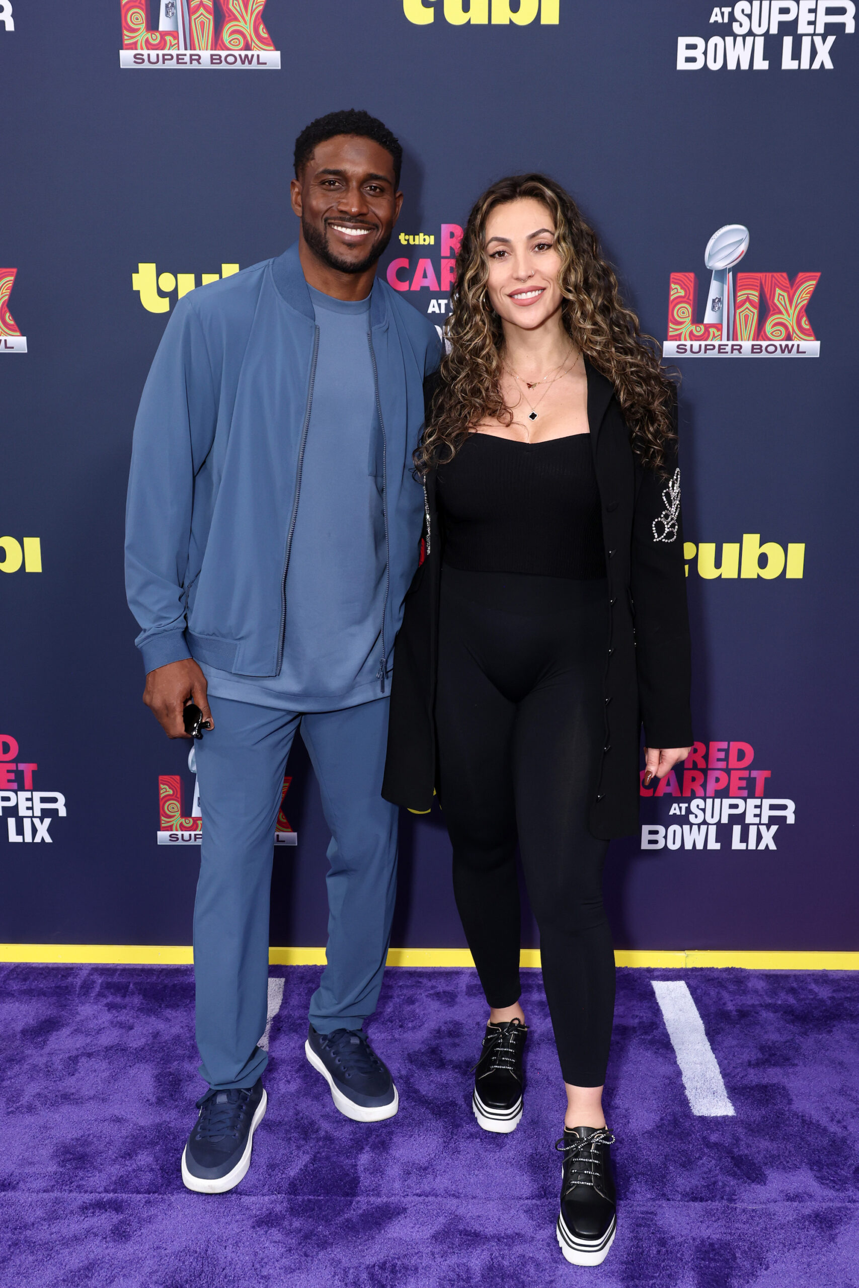 Reggie Bush and Lilit Bush attend the Tubi Red Carpet during the Super Bowl LIX