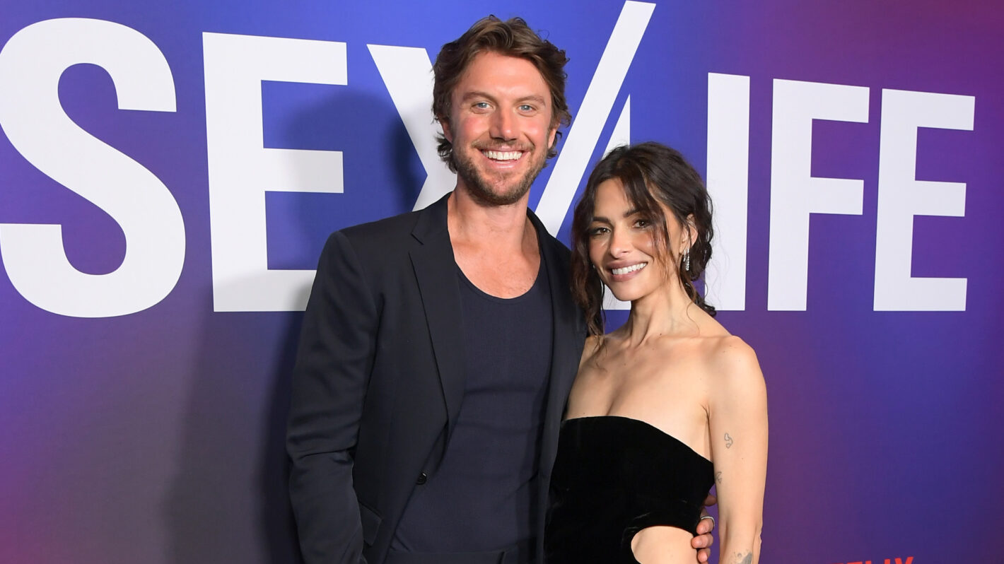 Adam Demos and Sarah Shahi attend Netflix's