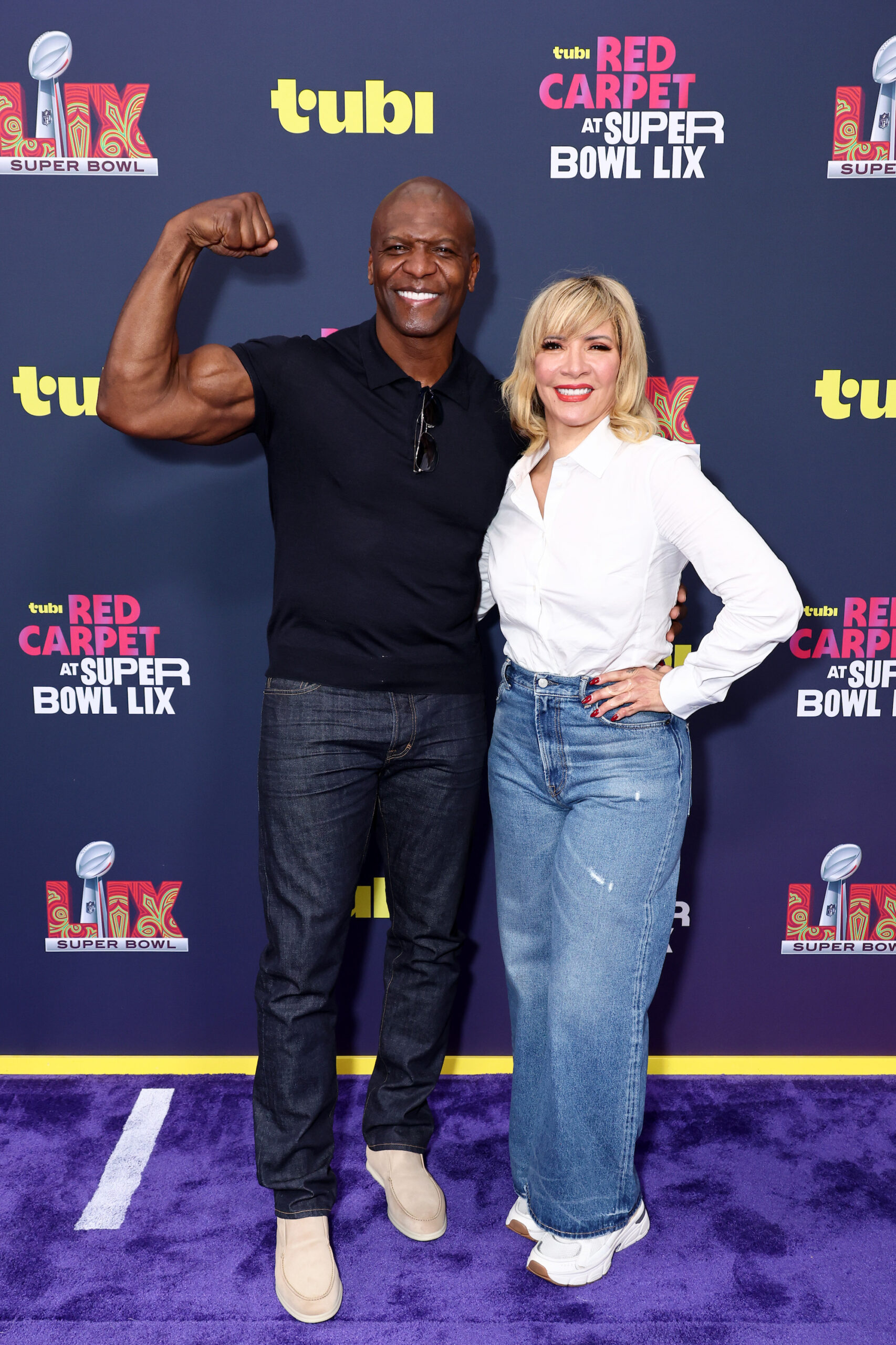 Terry Crews and Rebecca Crews attend the purple carpet during the Super Bowl LIX
