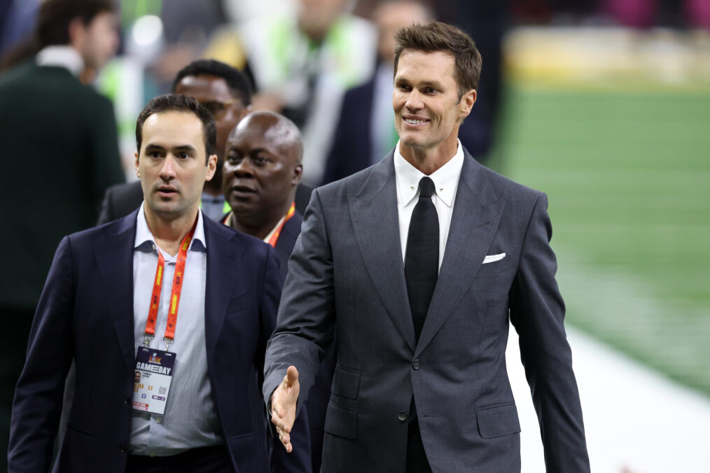 Tom Brady walks across the field before Super Bowl LIX