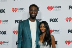 Dotun Olubeko and Charity Lawson attend the 2025 iHeartRadio Music Awards at Dolby Theatre on March 17, 2025 in Hollywood, California.