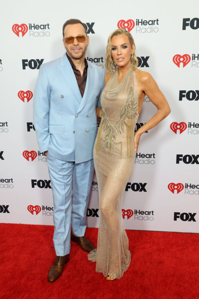 Donnie Wahlberg and Jenny McCarthy attend the 2025 iHeartRadio Music Awards at Dolby Theatre in Los Angeles, California on March 17, 2025. Broadcasted live on FOX.