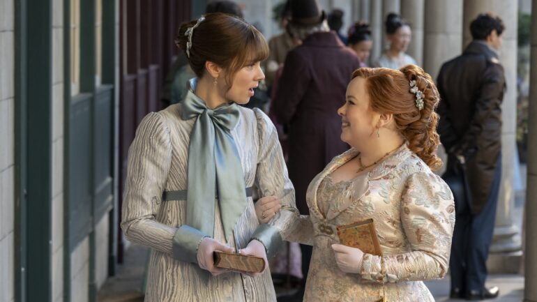 Claudia Jessie as Eloise Bridgerton, Nicola Coughlan as Penelope Featherington in episode 404 of Bridgerton