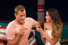 Colton Underwood and Tia Booth eating hotdogs