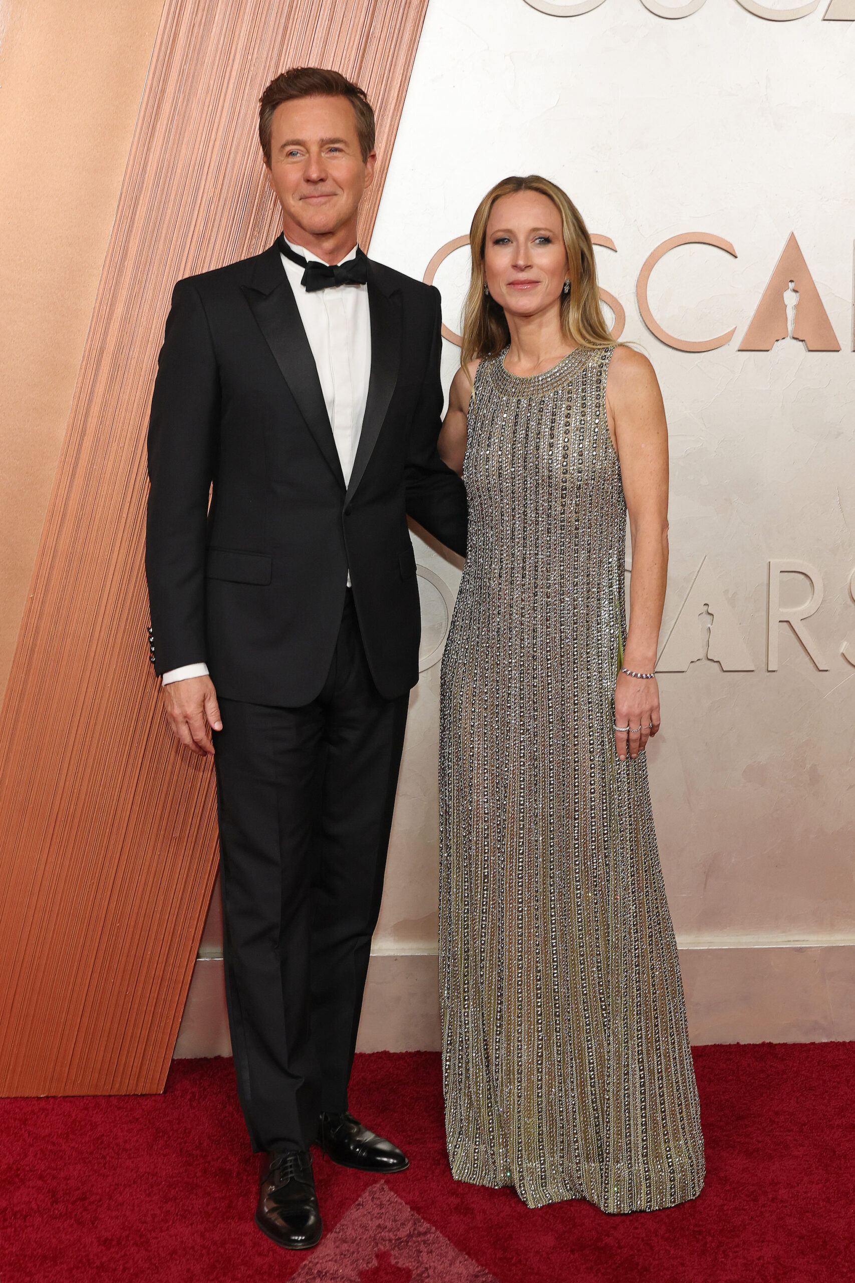 HOLLYWOOD, CALIFORNIA - MARCH 02: (L-R) Edward Norton and Shauna Robertson attend the 97th Annual Oscars at Dolby Theatre on March 02, 2025 in Hollywood, California.