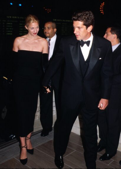 ohn F. Kennedy, Jr. and wife Carolyn attend a function in honor of his mother, Jacqueline Onasis, October 4, 1998 at Grand Central Station in New York City. July 16, 2000 marks the one year anniversary that John F. Kennedy Jr., 38, died in a plane crash off the coast of Martha's Vineyard with his wife Carolyn Bessette Kennedy, 33, and her sister Lauren Bessette, 34.