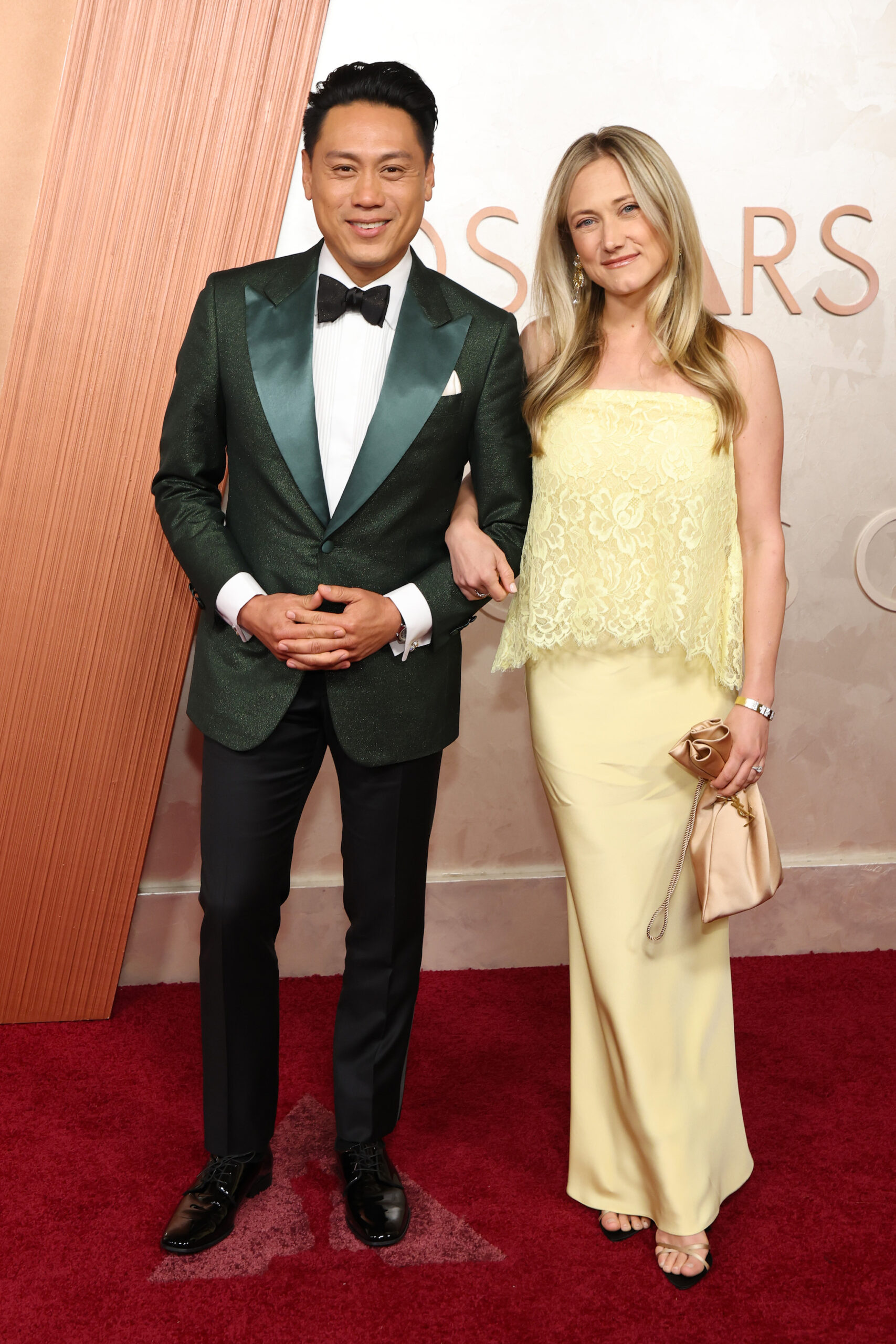HOLLYWOOD, CALIFORNIA - MARCH 02: (L-R) Jon M. Chu and Kristin Hodge attend the 97th Annual Oscars at Dolby Theatre on March 02, 2025 in Hollywood, California.