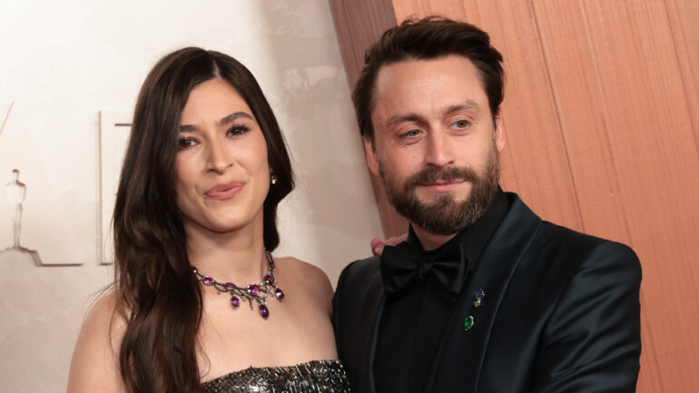HOLLYWOOD, CALIFORNIA - MARCH 02: (L-R) Jazz Charton and Kieran Culkin attend the 97th Annual Oscars at Dolby Theatre on March 02, 2025 in Hollywood, California.