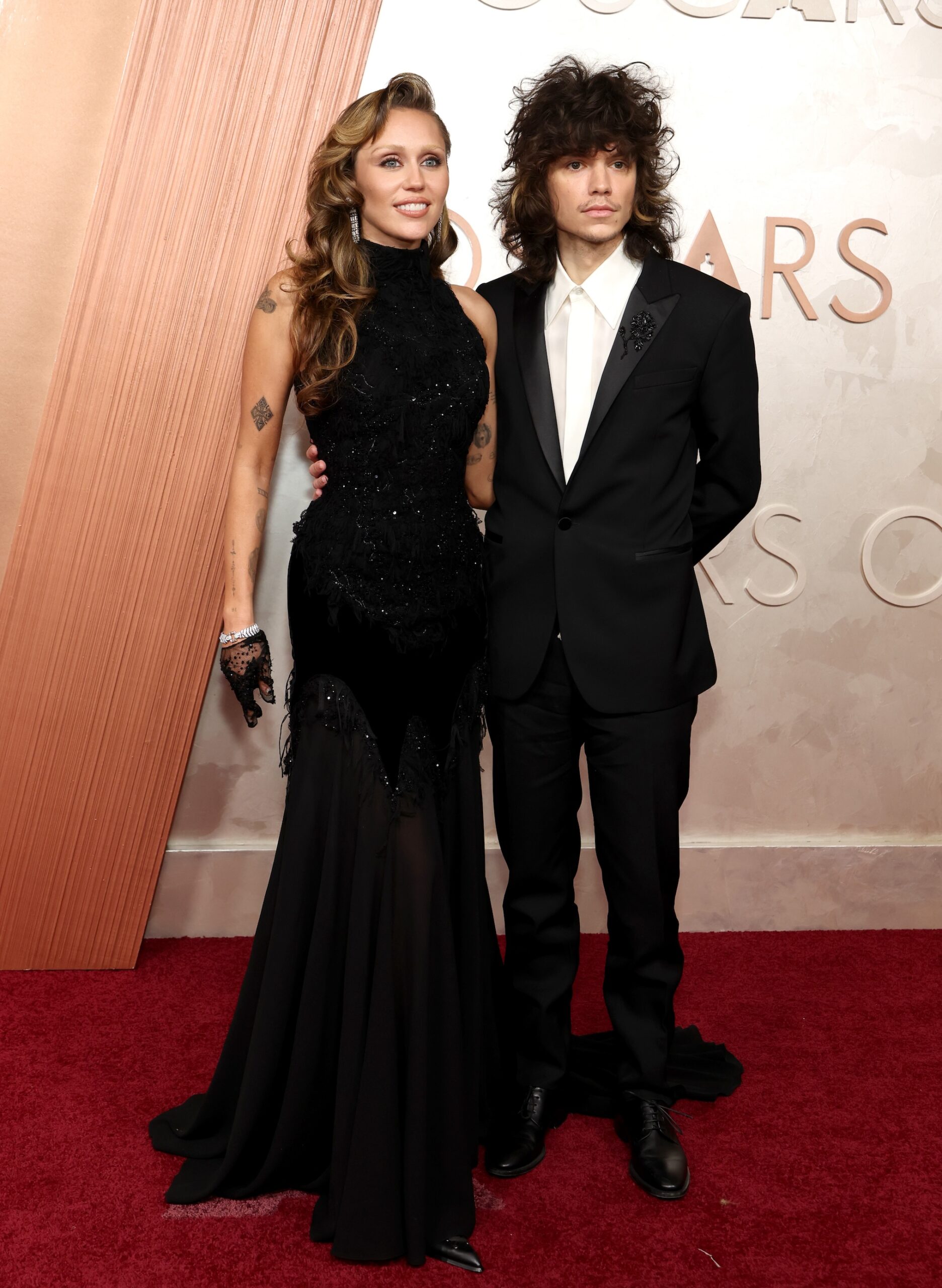 Miley Cyrus and Maxx Morando attend the 97th Annual Oscars at Dolby Theatre on March 02, 2025 in Hollywood, California.