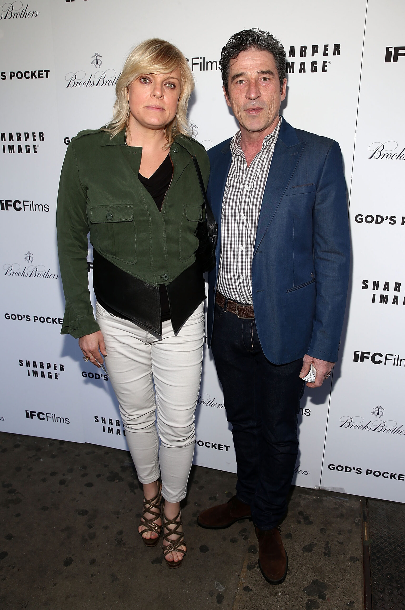 Molly Price and Derek Kelly attend 