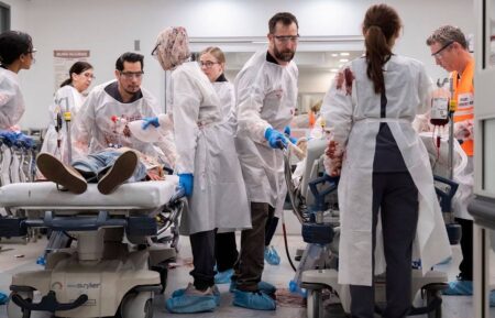 Taylor Dearden as King, Noah Wyle as Robby, and Shawn Hatosy as Abbott — 'The Pitt' Season 1 Episode 12