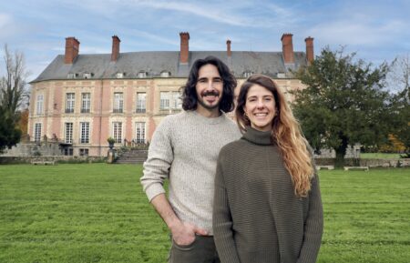 Ian Figueira and Daphne Reckert standing in front of the Chateau, as seen on Castle Impossible, Season 1