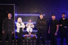 Aaron Goodwin, Jill Cook Richards, Zak Bagans, Billy Tolley and Jay Wasley pose with the clown doll prop featured in the movie, believed to contain sinister energy