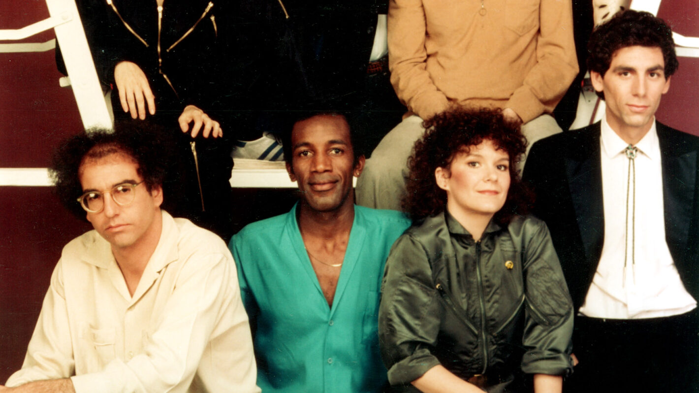 FRIDAYS, Top (L-R), Bruce Mahler, Melanie Chartoff, Mark Blankfield, John Roarke, Brandis Kemp. Front (L-R), Larry David, Darrow Igus, Maryedith Burrell, Michael Richards. 1980-1982.
