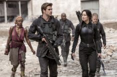 Commander Paylor (Patina Miller), Gale Hawthorne (Liam Hemsworth), Boggs (Mahershala Ali), Katniss Everdeen (Jennifer Lawrence), and Pollux (Elden Henson) in THE HUNGER GAMES: MOCKINGJAY PART 1.