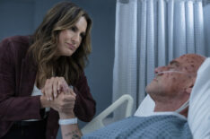 Mariska Hargitay as Capt. Olivia Benson and Chris Meloni as Det. Elliot Stabler in hospital bed in Law & Order: Organized Crime - Season 5
