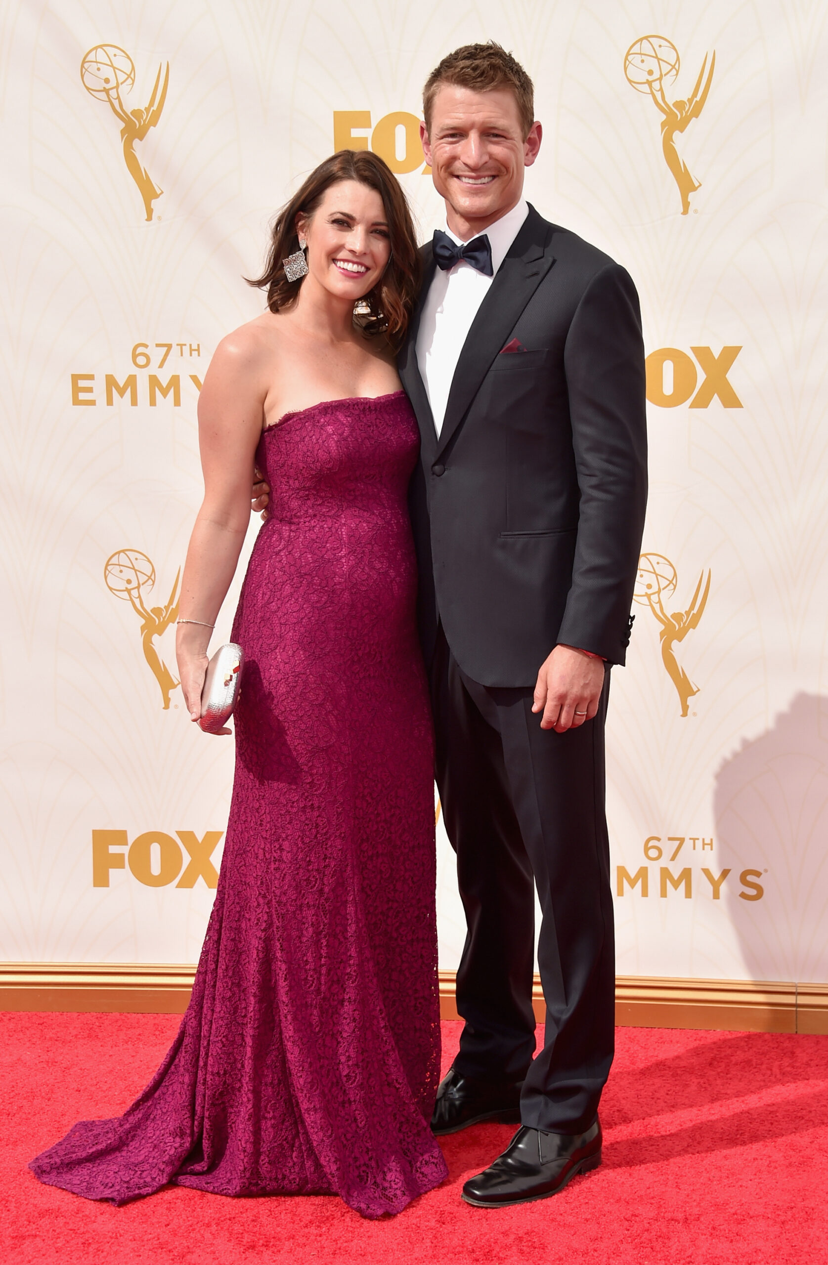 Megan Marie Coughlin (L) and actor Philip Winchester attend the 67th Emmy Awards